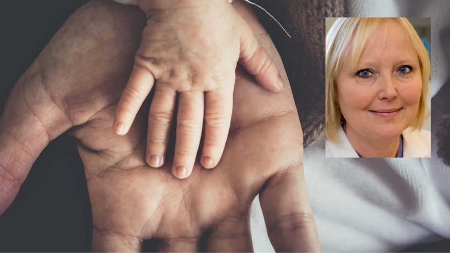 Fotot visar en liten barnhand i en stor barnhand.