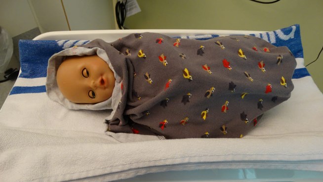 weighing doll
