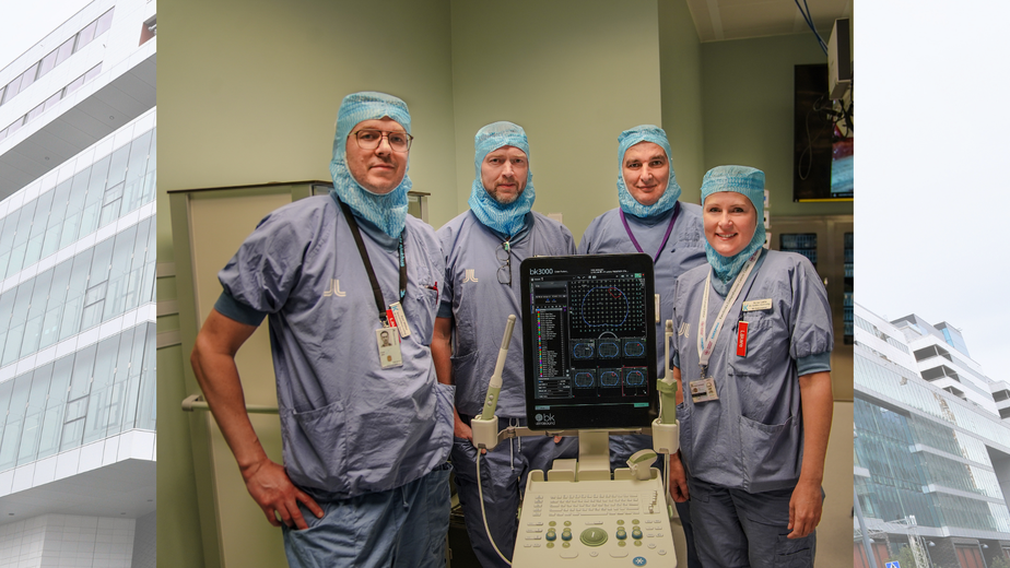 En grupp läkare som står i en operationssal.